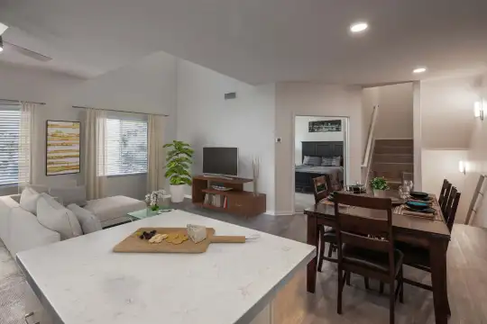 living room featuring plenty of natural light and TV