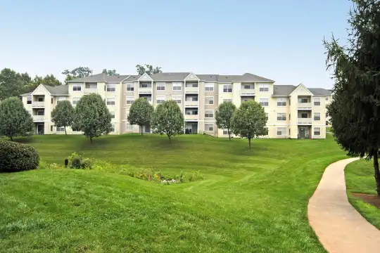 view of home's community featuring a large lawn