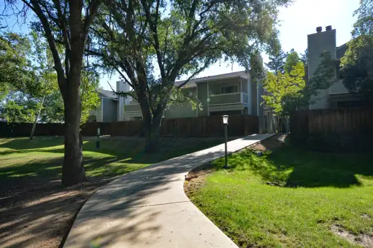 view of home's community featuring a yard