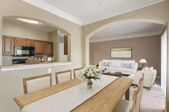 dining area featuring microwave and range oven