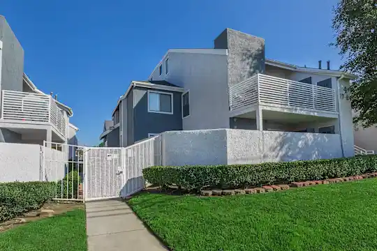 view of side of home featuring a lawn