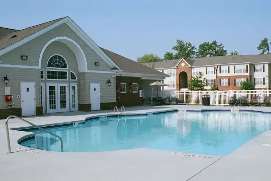 view of pool featuring french doors