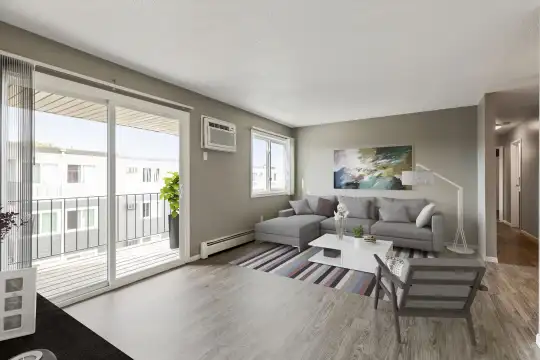 living room featuring hardwood flooring, plenty of natural light, and baseboard radiator