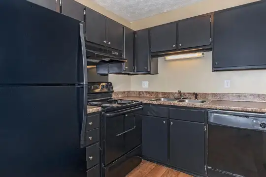 kitchen featuring refrigerator, stainless steel dishwasher, electric range oven, extractor fan, dark granite-like countertops, light floors, and dark brown cabinets