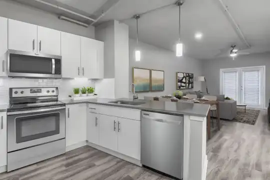 kitchen featuring electric range oven, stainless steel appliances, white cabinets, light countertops, pendant lighting, and light parquet floors