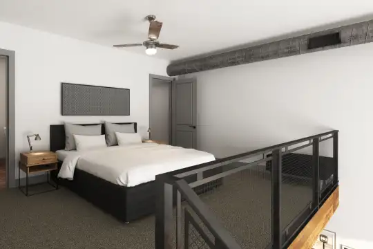 bedroom featuring hardwood floors and a ceiling fan