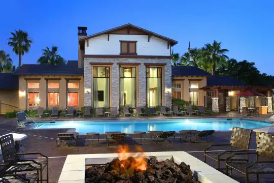 view of pool with fire pit