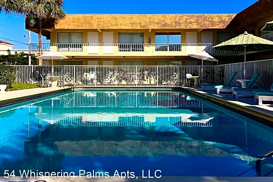 Whispering Palms Apartment Homes Photo 2