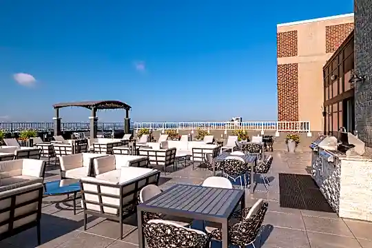 view of patio / terrace featuring an outdoor fireplace