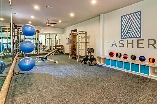 workout room featuring carpet
