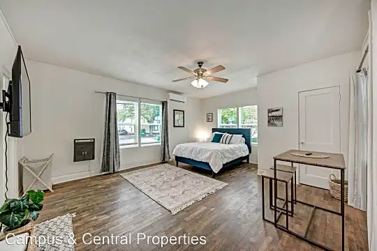 West campus cottages - gorgeous studios with hard wood floors and bright big windows. Photo 1