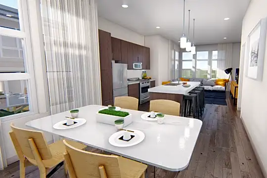 dining space featuring a center island, natural light, hardwood flooring, range oven, refrigerator, and microwave