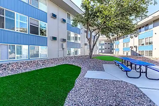 view of property featuring a lawn