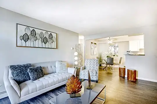 living room featuring hardwood floors and baseboard radiator