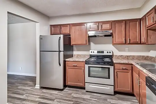 kitchen with ventilation hood, electric range oven, stainless steel refrigerator, dishwasher, stone countertops, light hardwood floors, and brown cabinetry