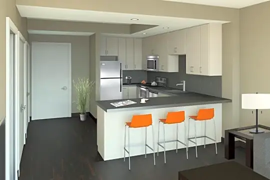 kitchen with a breakfast bar area, refrigerator, range oven, microwave, white cabinets, dark countertops, and dark hardwood floors
