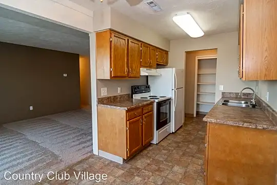 Country Club Village - Call today! Photo 2