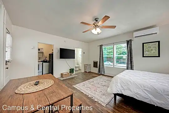 West campus cottages - gorgeous studios with hard wood floors and bright big windows. Photo 2