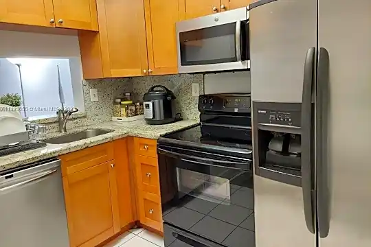486 NW 165th St #103 Photo 1