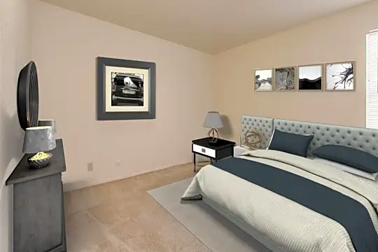 bedroom with carpet and lofted ceiling