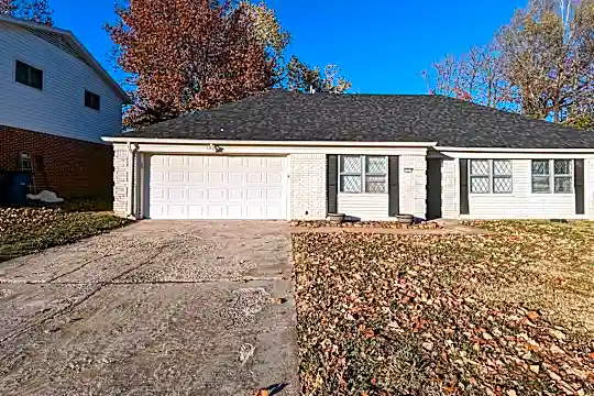 7037 E 58th Pl Photo 1