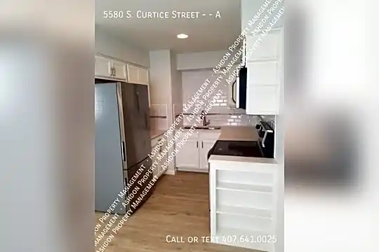 5580 S. Curtice Street - - A Photo 2