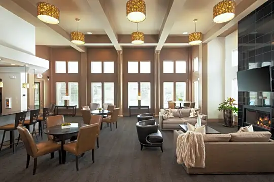 building lobby featuring hardwood flooring and TV