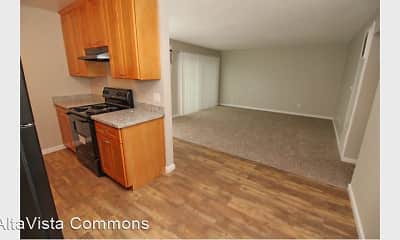 kitchen featuring extractor fan, electric range oven, light hardwood floors, brown cabinets, and light granite-like countertops, AltaVista Commons, 0