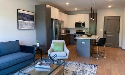 living room featuring a breakfast bar, stainless steel microwave, refrigerator, and range oven, Haven at Uptown, 1