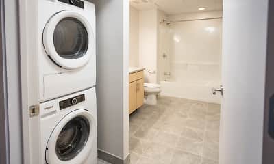 clothes washing area with tile floors and separate washer and dryer, Baltimore Station - 6402 Woodward, 2