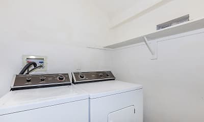 clothes washing area featuring vaulted ceiling and independent washer and dryer, Palm Court Apartment Homes, 2