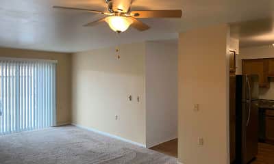 wood floored spare room with natural light, a ceiling fan, and refrigerator, Heather Downs Apartments, 1