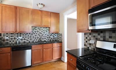 kitchen with stainless steel appliances, dark granite-like countertops, light parquet floors, and brown cabinets, 408-416 N. Taylor Avenue, 0