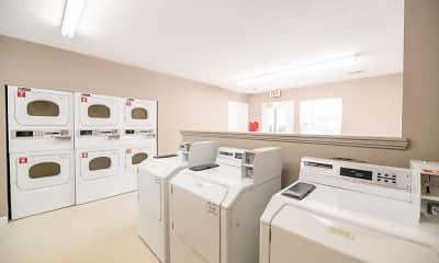 clothes washing area with tile floors, natural light, and separate washer and dryer, The Village at Brierfield, 0