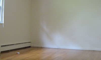 empty room featuring natural light, hardwood flooring, and baseboard radiator, Pompton Hills, 2