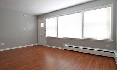 empty room with hardwood floors, generous sunlight, and baseboard radiator, 401-407 Washington Apartments, 1