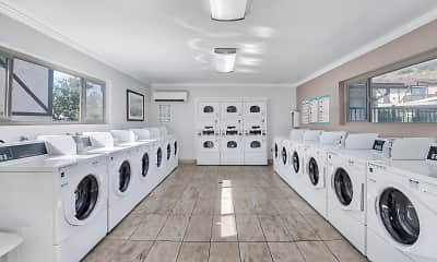 clothes washing area with natural light, tile flooring, a wall mounted air conditioner, and independent washer and dryer, Windsor Manor, 1