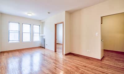 spare room with hardwood floors, natural light, and radiator, 7100 N. Sheridan Apartments, 1