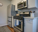 kitchen featuring stainless steel appliances, gas range oven, white cabinetry, light hardwood flooring, and light countertops, Renew Park Viva
