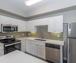 kitchen featuring stainless steel appliances, electric range oven, white cabinetry, light floors, and light countertops, The Lyndon