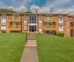 view of building exterior featuring an expansive lawn, Parkview Apartments
