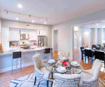 dining area featuring parquet floors, range oven, range hood, and refrigerator, Cathedral Commons