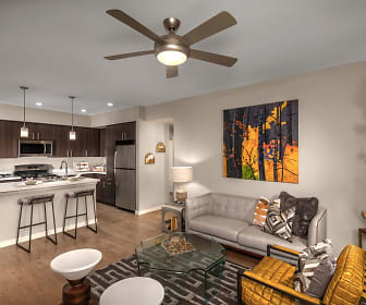 living room with a ceiling fan, hardwood flooring, stainless steel refrigerator, range oven, and microwave, Latitude 39