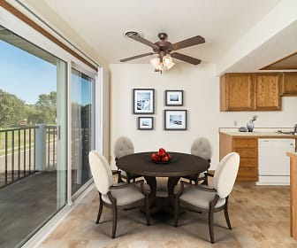 dining area with abundant sunlight, a ceiling fan, and dishwasher, The Concorde Apartments