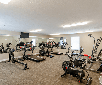workout area featuring tile flooring and TV, Mill Springs Townhomes