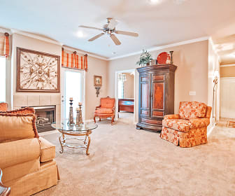 living room featuring a ceiling fan and carpet, Villages of Cross Creek