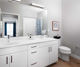 bathroom with hardwood floors, toilet, double sink vanity, mirror, and shower curtain, Avalon Saugus