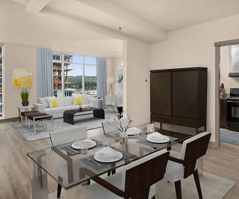 dining space featuring hardwood flooring, natural light, beamed ceiling, and range oven, Elements Apartments