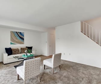 living room featuring carpet, Beaufort Manor