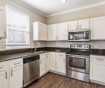 kitchen featuring natural light, stainless steel appliances, electric range oven, white cabinetry, dark parquet floors, and dark granite-like countertops, Bell Bradburn